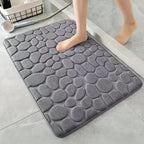 Rutschfeste 3D-Badematte mit hoher Saugfähigkeit – schnell trocknender, waschbarer Badteppich mit Steinrelief für Bad, Tür und Boden.